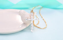 Charger l'image dans la galerie, Collier plaqué or avec pendentif croix diamant - le comptoir des croix