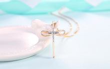 Charger l'image dans la galerie, Collier croix nœud papillon - le comptoir des croix