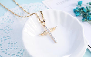 Collier croix ailes d'ange - le comptoir des croix